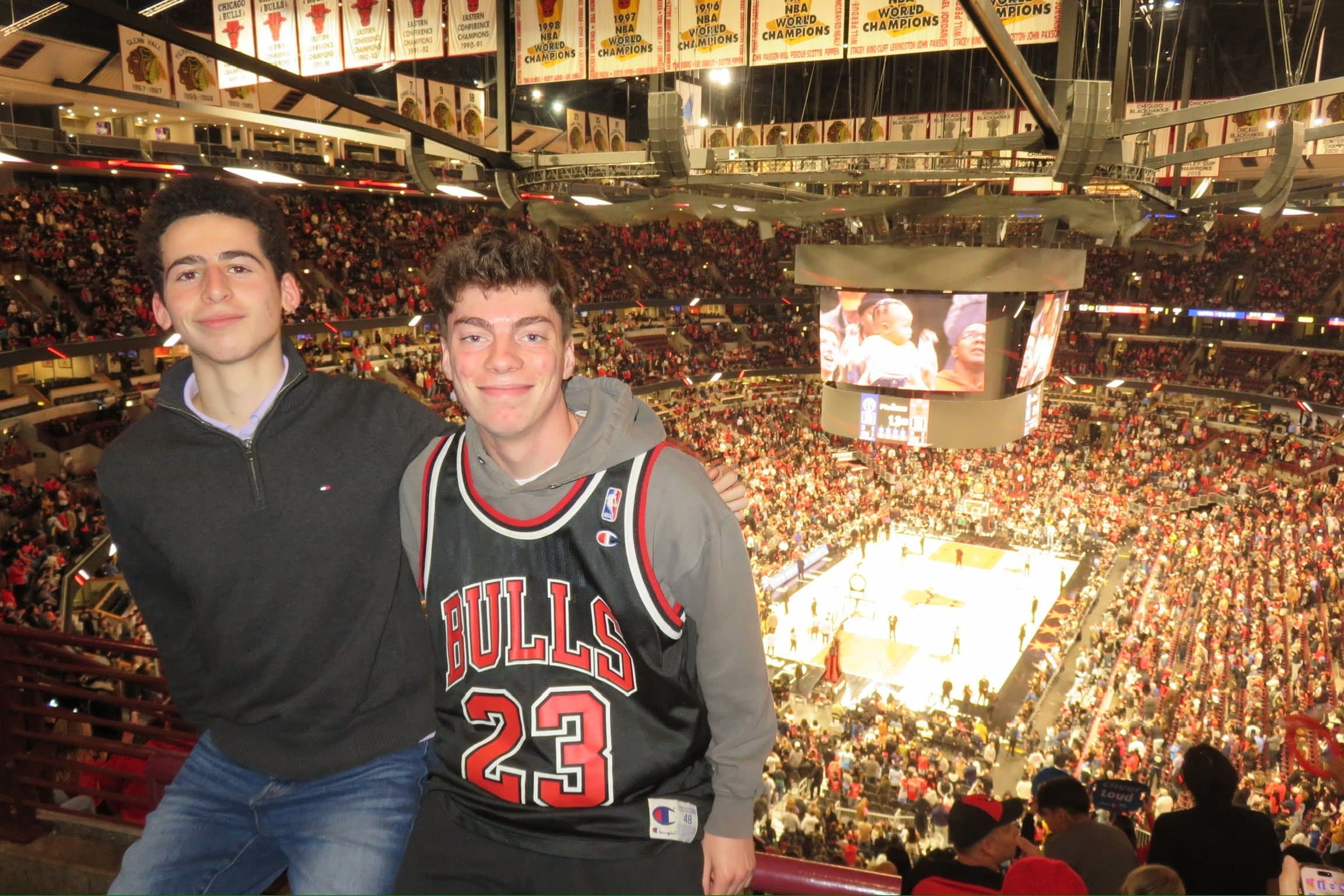 ori marx and a friend in the upper deck at a chicago bulls game at the united center
